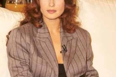 Claudia Koll nel 1995, sexy in giacca e stivali