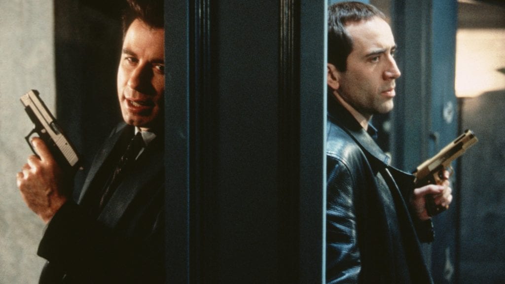 John Travolta e Nicolas Cage in Face/Off